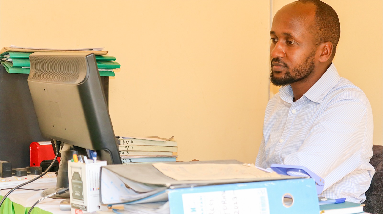 Secretariat at work · member records — UASA SACCO AGM, 20th July 2026